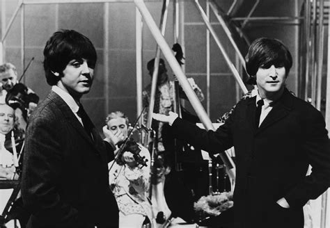 john lennon relationship with paul.